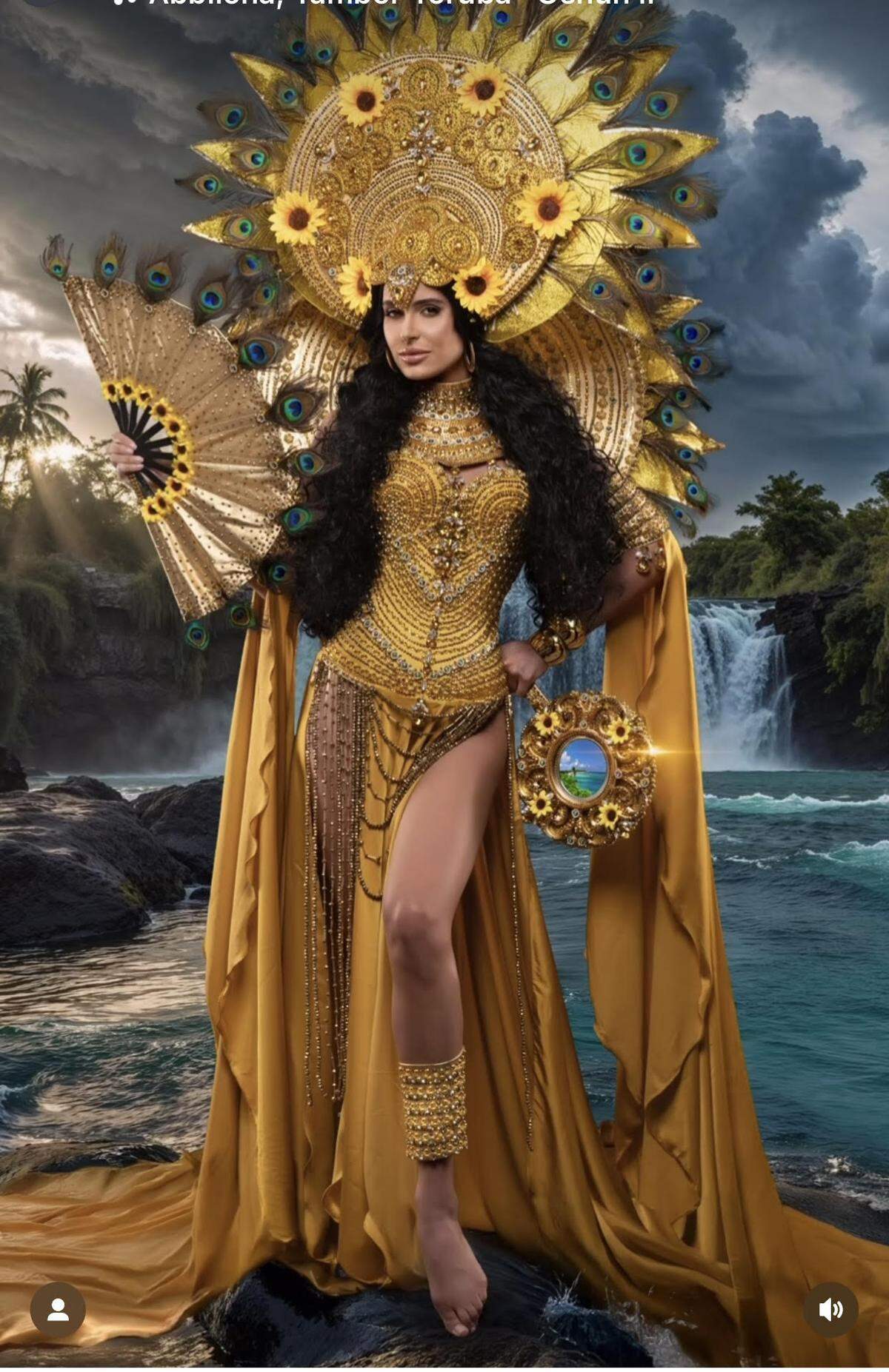 Marianela Ancheta, Miss Universe Cuba, llevó un traje amarillo dorado con una corona de girasoles inspirado en Oshún y la virgen de la Caridad del Cobre en el desfile de la noche preliminar de Miss Universo 2024, el 14 de noviembre en Ciudad de México.