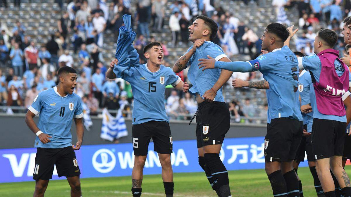 Players of Uruguay celebrate their team’s win over Israel at the end of a FIFA U-20 World Cup semifinal soccer match at the Diego Maradona stadium in La Plata, Argentina, Thursday, June 8, 2023..