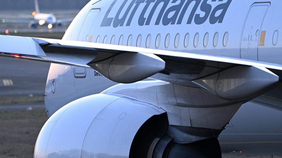 A Lufthansa airline jet is pictured during the sunset at the airport in Frankfurt am Main, western Germany, on April 4, 2025. (Photo by Kirill KUDRYAVTSEV / AFP) (Photo by KIRILL KUDRYAVTSEV/AFP via Getty Images)