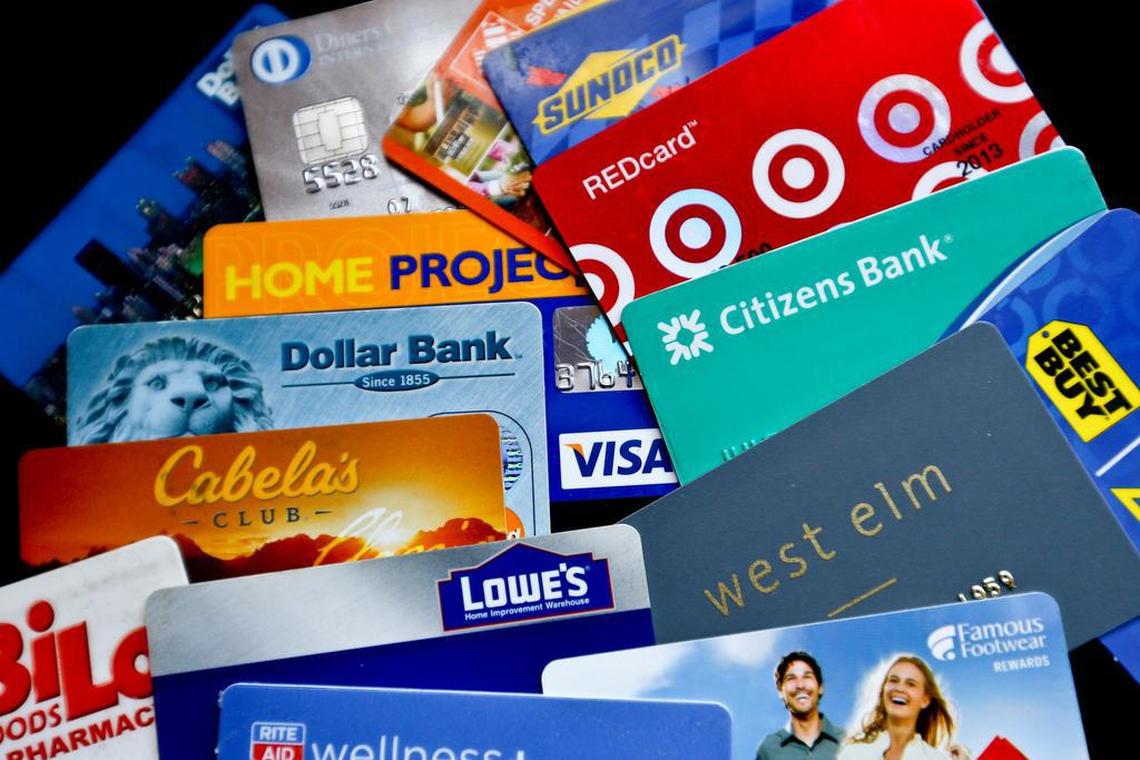 In this Jan. 31, 2018, photo, an assortment of credit cards and rewards cards are shown in Zelienople, Pa. (AP Photo/Keith Srakocic)