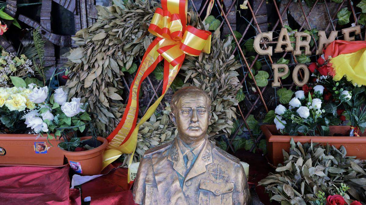 A bust of Spanish dictator Francisco Franco is pictured at his mausoleum, at the cemetery of Mingorrubio-El Pardo northern Madrid, which has been decorated with flags and messages left by worshippers as pictured on January 9, 2025. 2025 marks the 50th anniversary of the late dictator's death. (Photo by Thomas COEX / AFP) (Photo by THOMAS COEX/AFP via Getty Images)