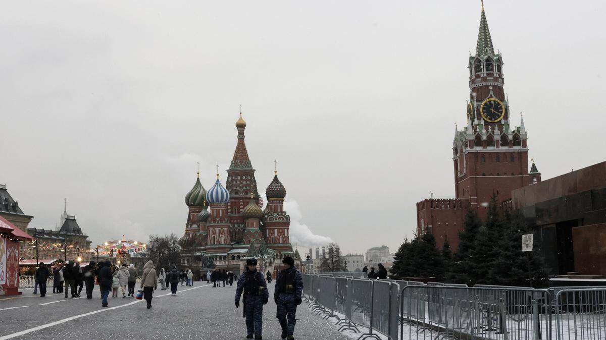 Russian police officers patrol the Red Square in Moscow on February 13, 2025. Russians were cautiously upbeat after Vladimir Putin and Donald Trump spoke by phone on February 13, 2025, praising it as a "first step" towards repairing ruptured ties between the two nuclear-armed superpowers. (Photo by TATYANA MAKEYEVA / AFP) (Photo by TATYANA MAKEYEVA/AFP via Getty Images)