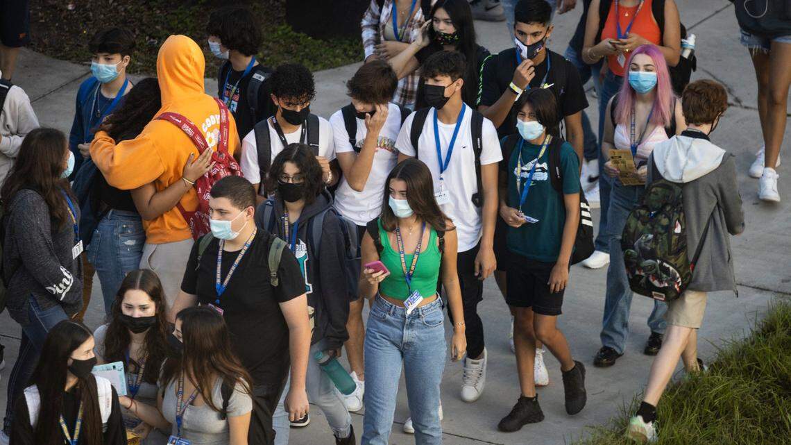 File photo of Broward Cypress Bay High School students returning to school under a school board mask mandate on Aug. 18.