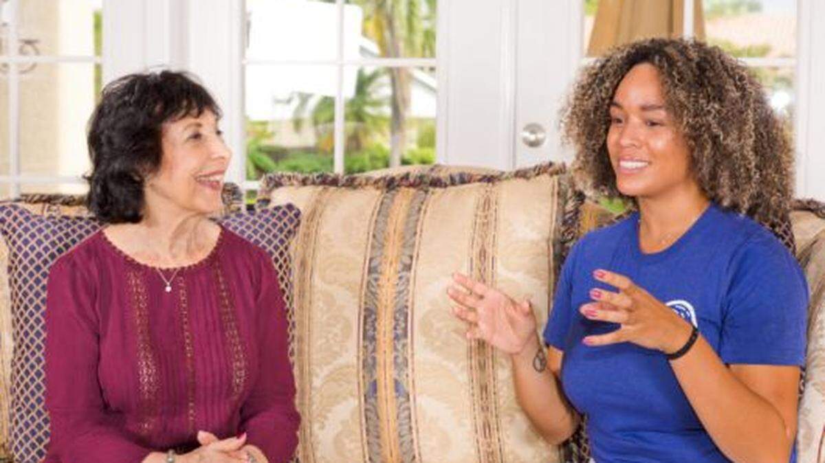 A Papa “pal” meets with her client as part of the Miami-based company’s “family on demand” service.
