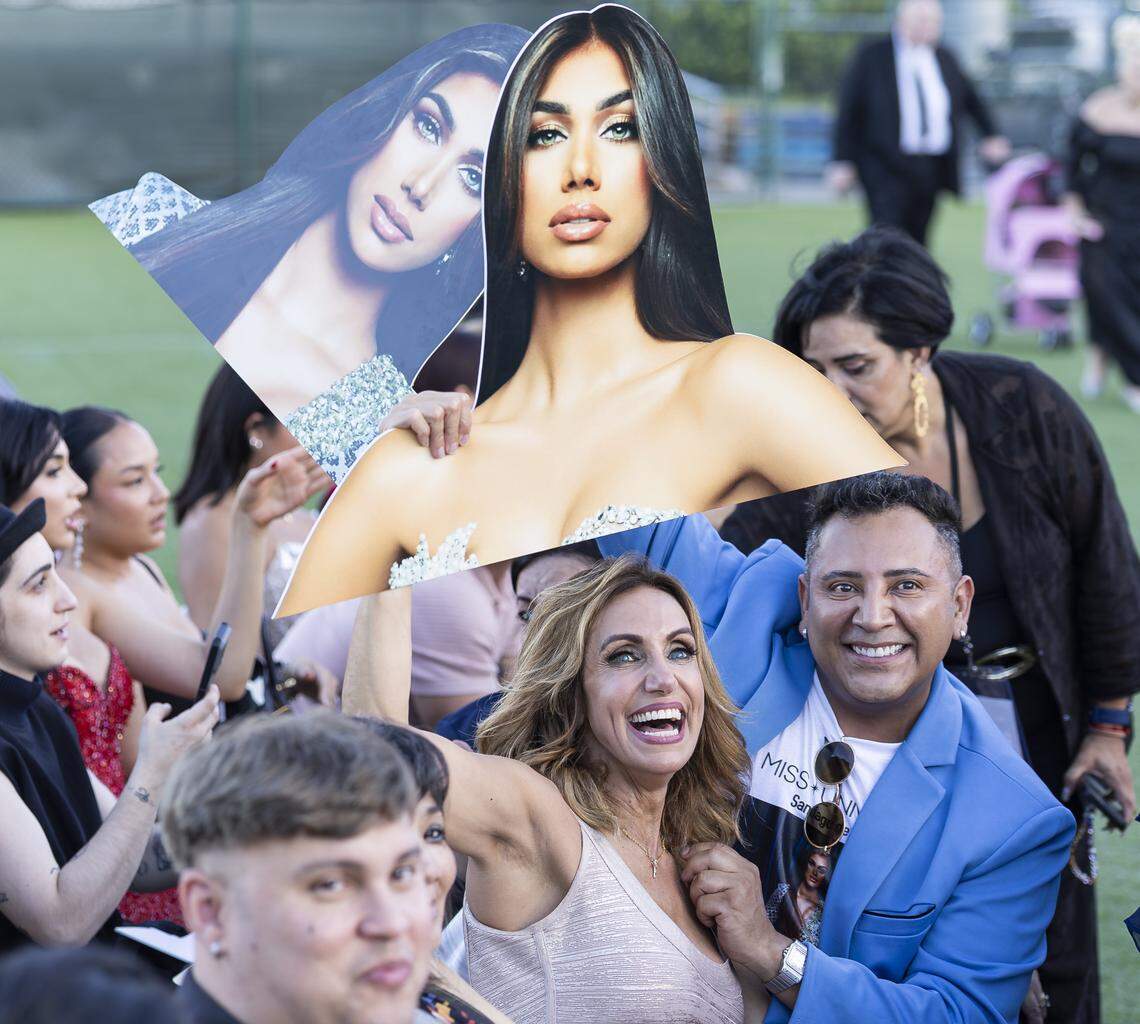 Cuban-American TV show host Lili Estefan holds a photo of her daughter, Lina Luaces, during the Miss Universe Cuba 2025 pageant at Milander Park on Tuesday, July 8, 2025, in Hialeah, Fla.