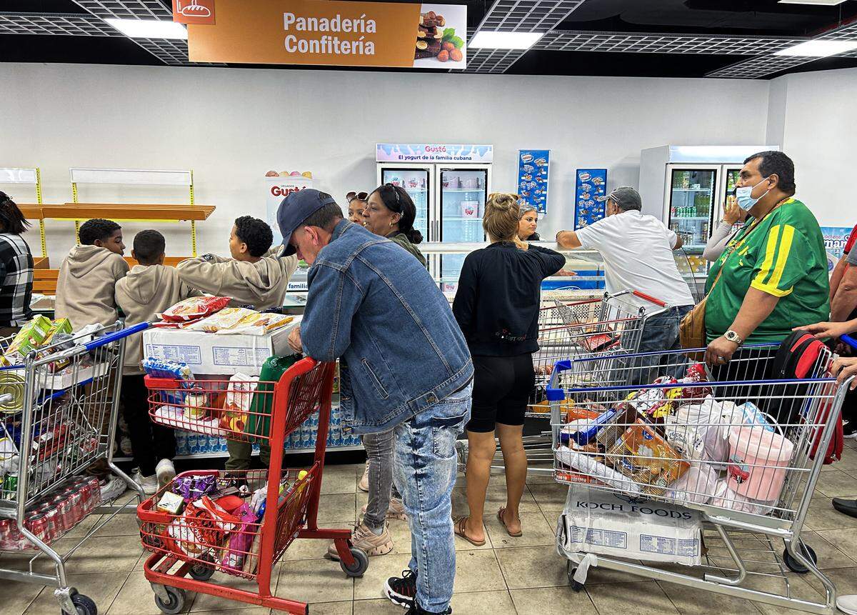 Cubans shop at the new dollar-only supermarket in Havana on January 5, 2025. Frequent amendments to Cuban laws are a major red flag for investors.