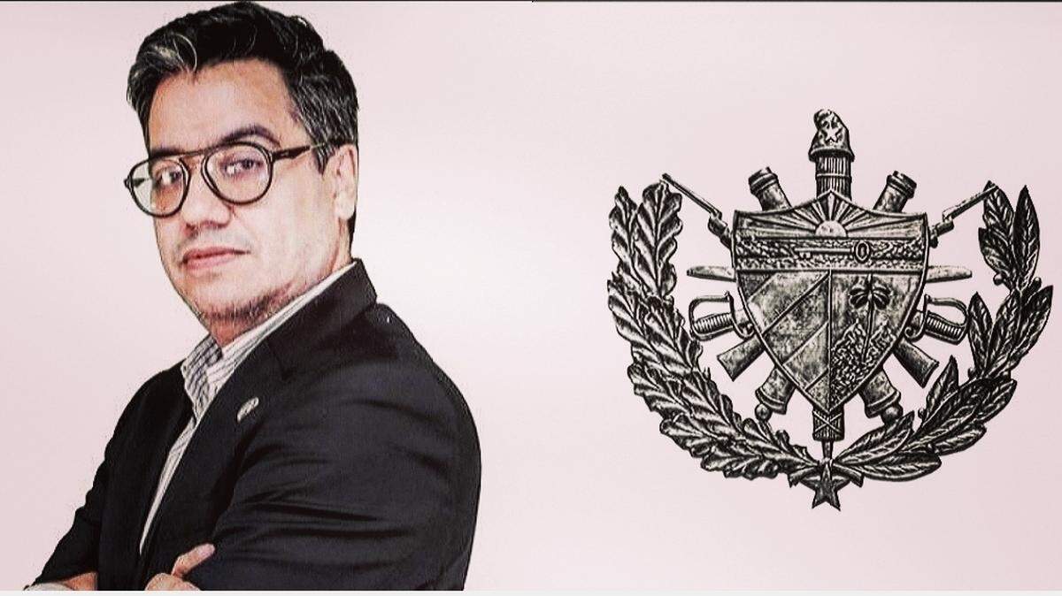 Manuel Milanés y el símbolo del Consejo para la Guerra (Foto editada by Layout)