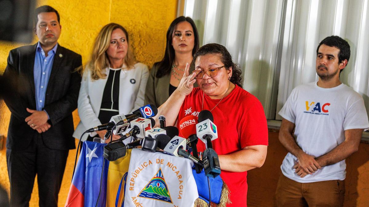Bertha Sandles reacts as she tells her family story during a press conference at El Arepazo in Doral, called by the AFSC, FLIC and the Venezuelan American Caucus, as the Nicaraguan and Venezuelan communities continue asking the President to use his executive power to protect more than 700,000 families in Florida. on Tuesday, August 15, 2023.