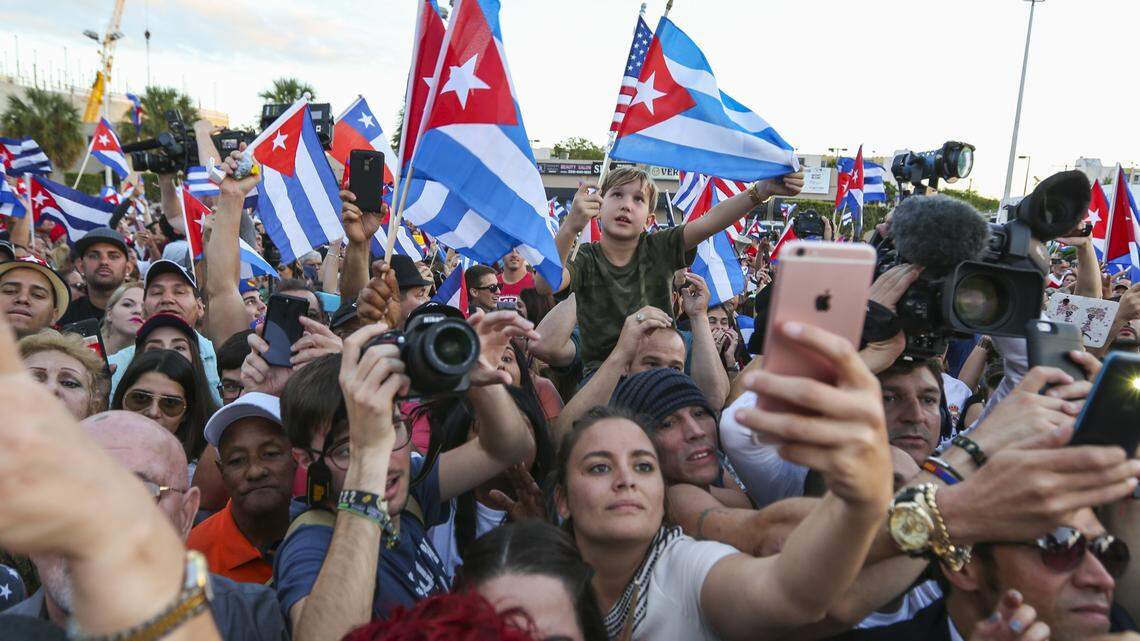 Hundreds of Cuban Americans gather in front of Versailles restaurant in Miami’s Little Havana after Fidel Castro’s death.