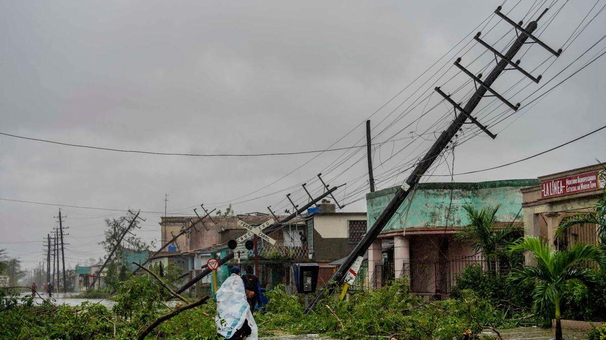 Electric poles were blown askew in Pinar del Río, Cuba, during Hurricane Ian.