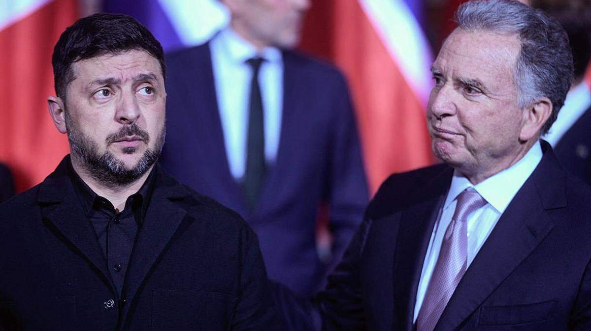 Ukraine's President Volodymyr Zelensky and US special envoy Steve Witkoff talk as they pose for a family photo on December 15, 2025 at the Chancellery in Berlin, where they meet for talks on how to end the grinding war of Russia with Ukraine. (Photo by Markus Schreiber / POOL / AFP via Getty Images)