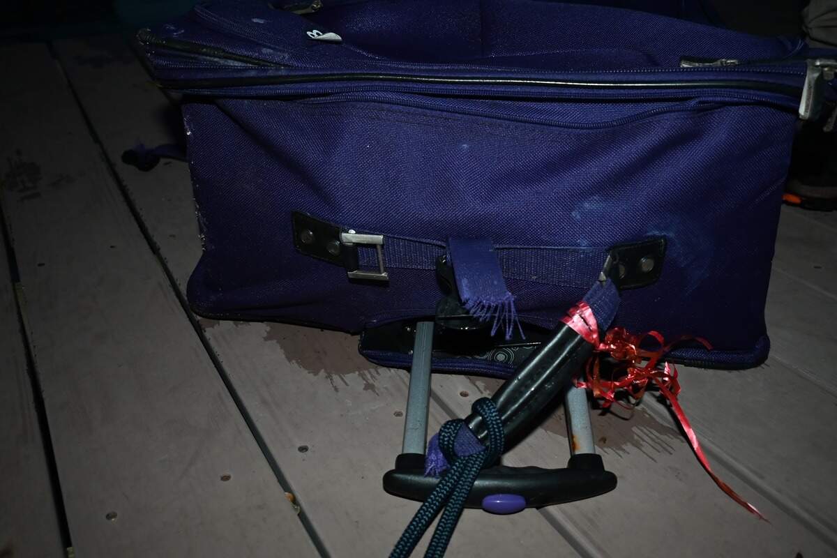 La policía también divulgó fotos de las tres maletas en la que se encontraron los restos de la víctima.