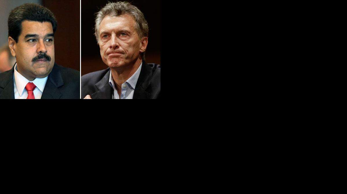 El mandatario venezolano, Nicolás Maduro y el presidente electo argentino, Mauricio Macri.