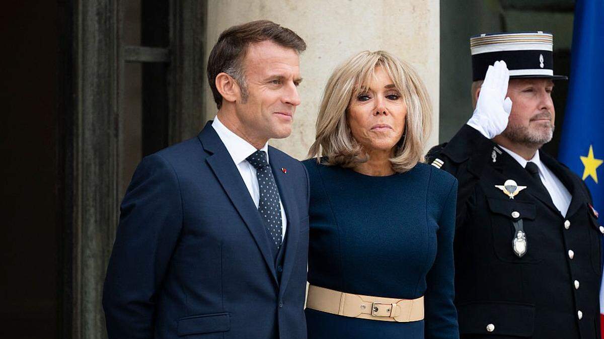 French President Emmanuel Macron and French President s wife Brigitte Macron pose before a meeting with Jordan s Crown Prince at the Elysee Palace in Paris on October 8, 2025. (Photo by Magali Cohen / Hans Lucas via AFP) (Photo by MAGALI COHEN/Hans Lucas/AFP via Getty Images)