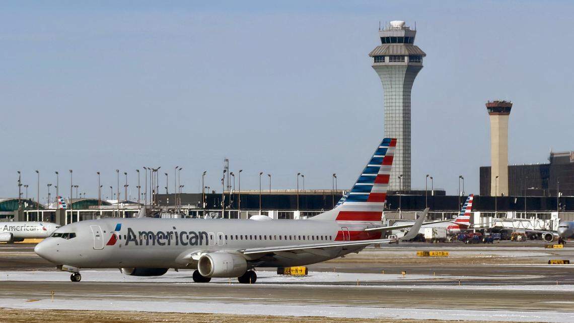 An American Airlines plane taxis at Chicago O'Hare International Airport in the northwest side of Chicago, Illinois on January 15, 2026. (Photo by Daniel SLIM / AFP via Getty Images)