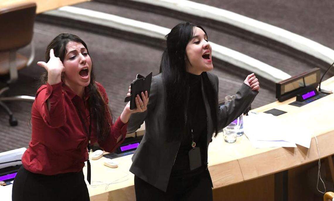 Members of the Cuban mission to the United Nations protest on Oct. 16 as the United States tried to launch a campaign at the U.N. highlighting the plight of Cuban political prisoners. U.S. Secretary of State Mike Pompeo called the demonstration a “childish temper tantrum” on Tuesday.