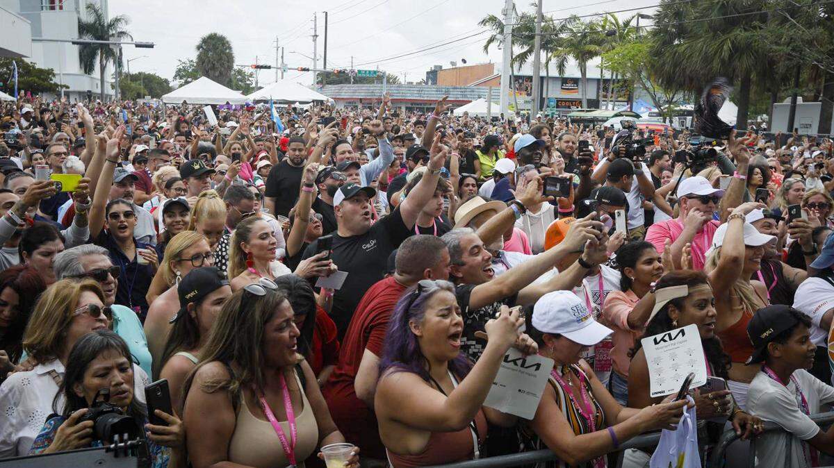 Crowds cheer Gente de Zona during the 47th annual Calle Ocho Festival on Sunday, March 10, 2024, in Little Havana.
