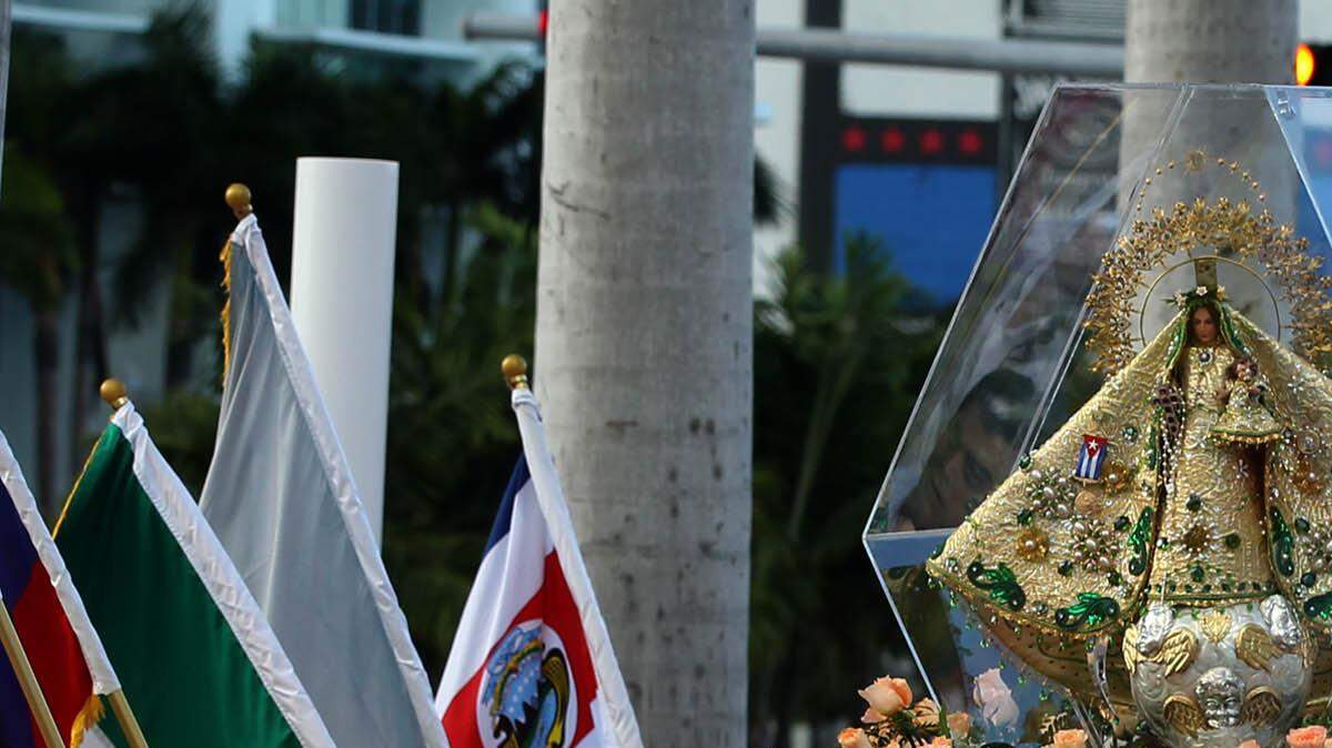 A procession carried La Virgen de la Caridad- Our Lady of Charity, patroness of Cuba trough Biscayne Boulevard after  arriving by boat  at the American Airlines Arena for the 400 Anniversary celebration Saturday September 8, 2012.