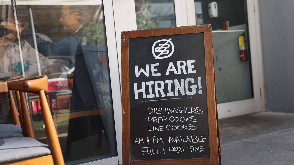 A sign at a Miami restaurant offered employment for a variety of jobs on March 5.