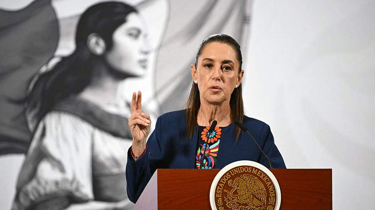 Mexico's President Claudia Sheinbaum speaks during her daily press conference at Palacio Nacional in Mexico City on November 17, 2025. Mexican President Claudia Sheinbaum said on Monday that behind Saturday's march against her government, in which more than 100 people were injured, were opposition politicians, violent groups and a campaign from abroad. (Photo by Yuri CORTEZ / AFP) (Photo by YURI CORTEZ/AFP via Getty Images)