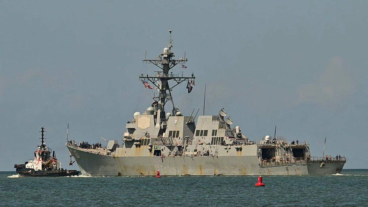 The USS Gravely, a US Navy warship, departs the Port of Port of Spain on October 30, 2025. The US warship arrived in Trinidad and Tobago on October 26, 2025, for joint exercises near the coast of Venezuela, as Washington ratcheted up pressure on drug traffickers and Venezuelan leader Nicolas Maduro. (Photo by MARTIN BERNETTI / AFP) (Photo by MARTIN BERNETTI/AFP via Getty Images)