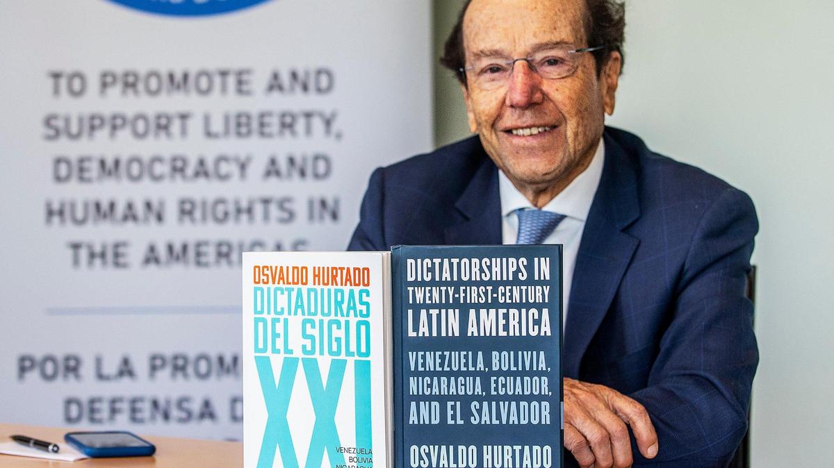 Ex Ecuadorian President Osvaldo Hurtado Larrea posed with his books titled “Dictatorships in Twenty-First-Century Latin America” at Florida International University in Miami, on Tuesday March 21, 2023.