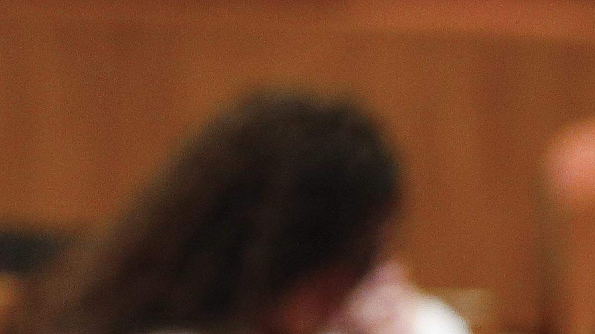 Los miembros de la audiencia rezan el miércoles, 23 de de marzo, 2016, durante un momento de silencio en homenaje a las víctimas de los ataques del martes en Bruselas, en un simposio de la Comunidad Ahmadía del Islam de Metro Detroit en Dearborn, Michigan.