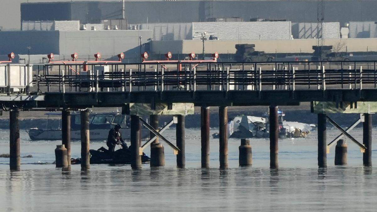 Rescue efforts underway in Potomac River on Thursday, Jan. 30, 2025 near Washington Reagan Airport following the crash of American Airlines plane and a military helicopter that occurred on Wednesday, Jan. 29, 2025.