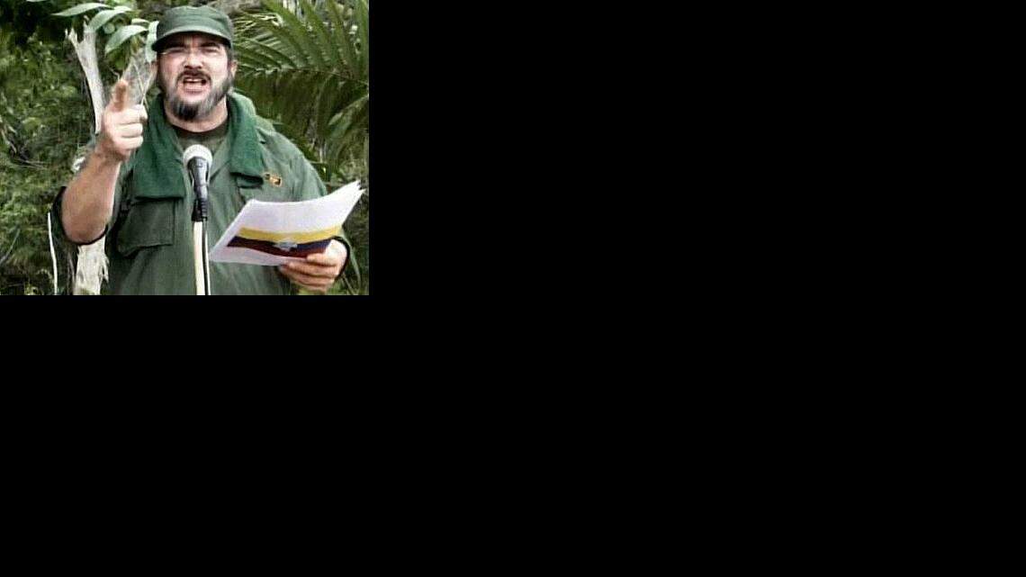 Rodrigo Londoño Echeverri (alias "Timochenko''), cuando confirmó la muerte del líder de las FARC Manuel Marulanda, en mayo del 2008. El gobierno de Colombia anunció el jueves 9 de octubre del 2014 que "Timochenko" ha visitado de manera clandestina a Cuba, lugar en donde se realizan las conversaciones de paz entre el gobierno y la guerrilla.  
