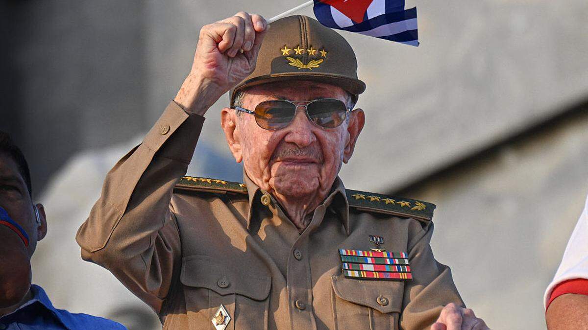 Cuba’s former President Raul Castro waves a Cuban national flag during the commemoration of May Day (Workers’ Day) at Havana’s Revolution Square on May 1, 2025