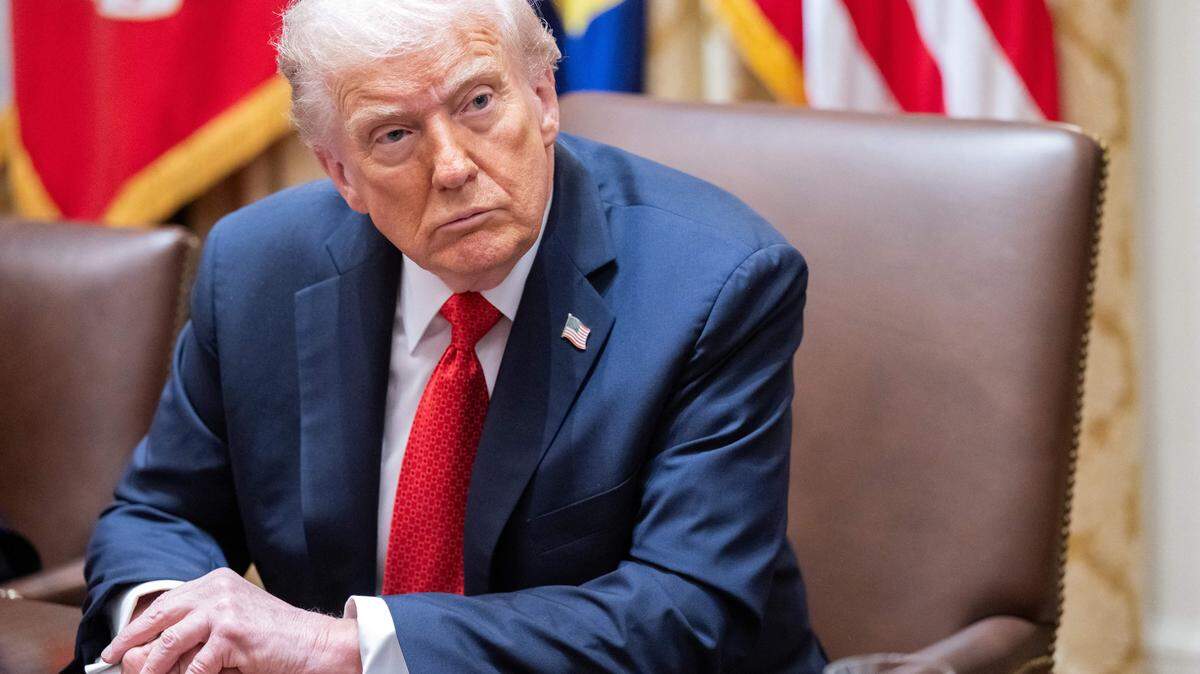 US President Donald Trump (R) speaks during a meeting with Australia's Prime Minister Anthony Albanese in the Cabinet Room at the White House in Washington, DC, on October 20, 2025. (Photo by SAUL LOEB / AFP) (Photo by SAUL LOEB/AFP via Getty Images)