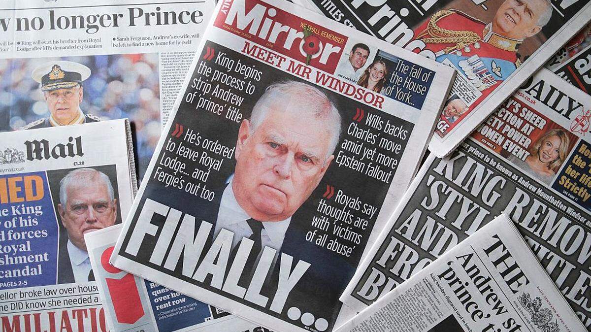 WINDSOR, ENGLAND - OCTOBER 31: In this photo illustration, the front page of the Daily Mirror newspaper with an image of Andrew Mountbatten Windsor is seen on October 31, 2025 in Windsor, England. King Charles III has started the formal process of removing the Titles, Styles and Honours of his brother, who will now be known as Andrew Mountbatten Windsor. Mr Mountbatten Windsor will also surrender the lease on Royal Lodge, where he has lived since 2004, and move to private accommodation. The historic move follows allegations of sexual abuse linked to the former prince's relationship with child sex offender Jeffrey Epstein. (Photo Illustration by Ming Yeung/Getty Images)
