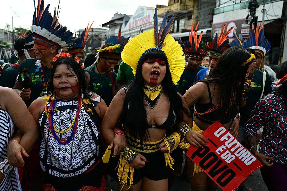 Indigenous people take part in a demonstration called "Indigenous People Global March" during the COP30 UN Climate Change Conference in Belem, Para state, Brazil, on November 17, 2025. (Photo by Pablo PORCIUNCULA / AFP) (Photo by PABLO PORCIUNCULA/AFP via Getty Images)
