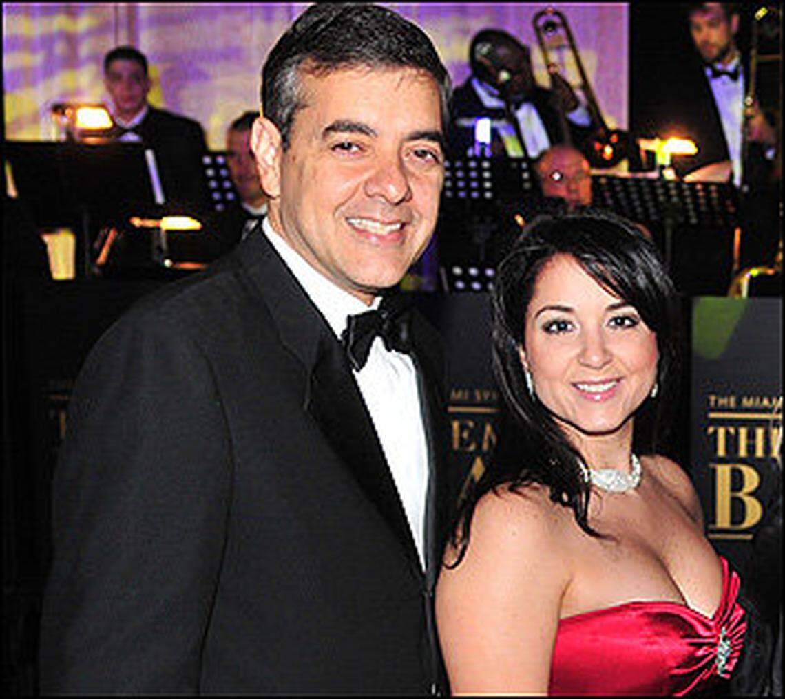 Former Congressman David Rivera and Esther Nuhfer, seen in 2011.