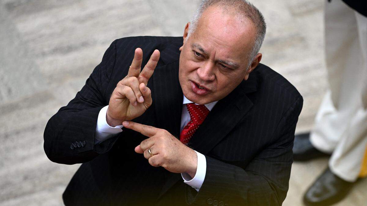 Venezuela's Minister of the Popular Power for Interior Diosdado Cabello gestures as he arrives to a presidential address to Parliament at the National Assembly in Caracas on January 15, 2026. US President Donald Trump is scheduled to meet Thursday with Venezuelan opposition leader Maria Corina Machado, whose pro-democracy movement he has sidelined since toppling her country's leader, and whose Nobel Peace Prize he openly envies. (Photo by Federico PARRA / AFP via Getty Images)