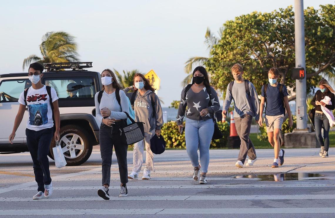 Students walk to the MAST Academy on the first day back of in-person learning, Wednesday, Oct. 7. A few days after the school reopened, administrators closed the school for one day due to two students testing positive for COVID-19.