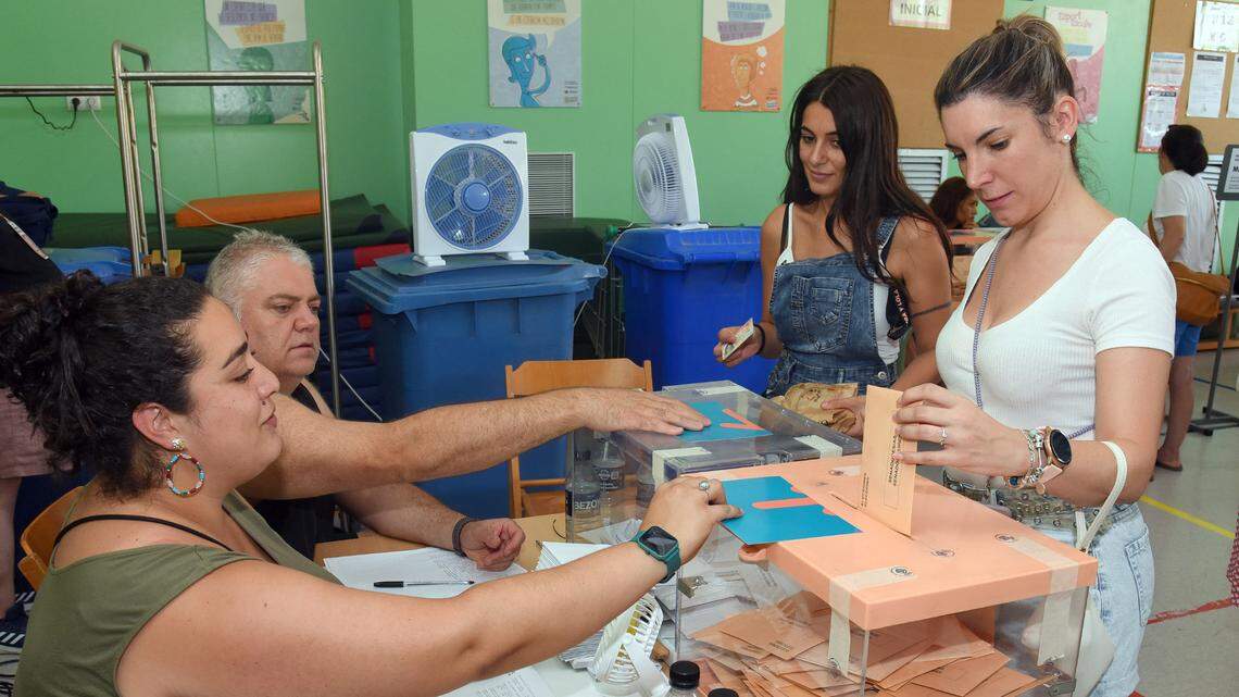 A woman casts her vote in Spain’s general elections on July 23, in L’Hospitalet, southwest of Barcelona.