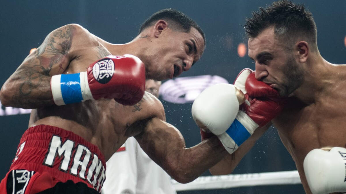Enmanuel Rodrífguez (izq.) superó a Jason Moloney en Orlando.