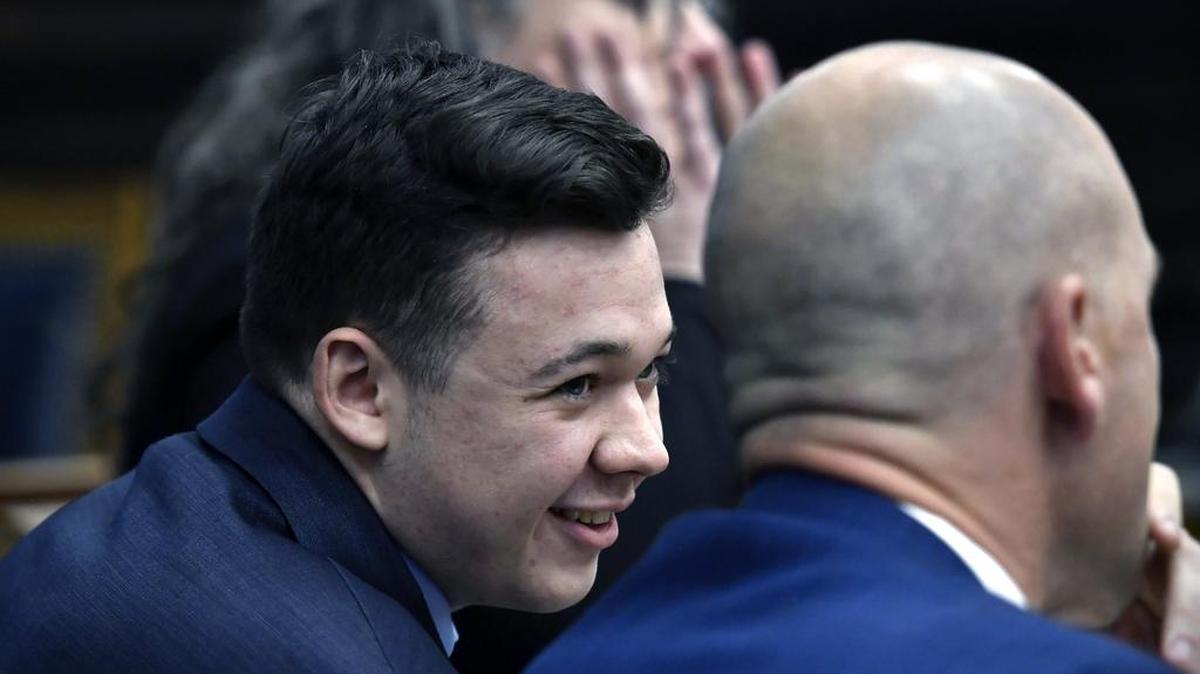 KENOSHA, WISCONSIN - NOVEMBER 18: Kyle Rittenhouse speaks with his attorneys before the jury is relieved for the evening during his trial at the Kenosha County Courthouse on November 18, 2021 in Kenosha, Wisconsin. Rittenhouse is accused of shooting three demonstrators, killing two of them, during a night of unrest that erupted in Kenosha after a police officer shot Jacob Blake seven times in the back while being arrested in August 2020. Rittenhouse, from Antioch, Illinois, was 17 at the time of the shooting and armed with an assault rifle. He faces counts of felony homicide and felony attempted homicide. (Photo by Sean Krajacic - Pool/Getty Images)