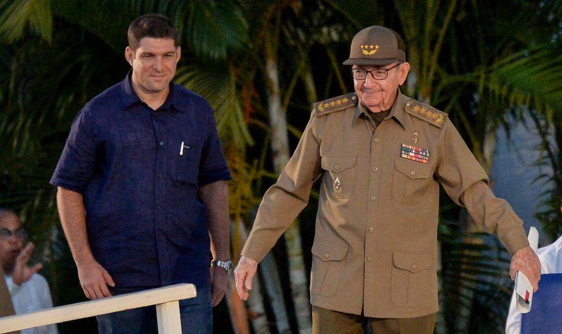 Cuban former president and first secretary of the Cuban Communist Party, Raul Castro (R), escorted by his grandson and bodyguard Raul Guillermo Rodriguez Castro, is pictured during the celebrations of the Moncada Barracks assault's 65th anniversary, in Santiago de Cuba on July 26, 2018. Rodriguez Castro has held talks with U.S. Secretary of State Marco Rubio.