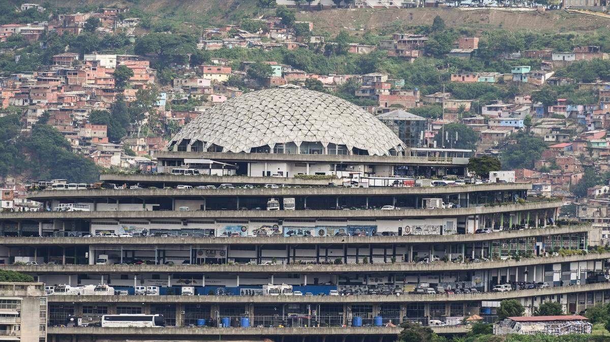 A general view of the El Helicoide building, headquarters of the Bolivarian National Intelligence Service (SEBIN) in Caracas, taken on July 28, 2023. A virtual reality project denounces "systematic torture" in the feared dungeons of El Helicoide, where the intelligence service of Venezuela operates. "We are looking for decision makers to promote the closure of torture centres. We want the Helicoide to be closed," Victor Navarro, director of Voces de la Memoria, the NGO that developed the project, said in an interview with AFP in Buenos Aires, where he has been living for four and a half years as a refugee. (Photo by Yuri CORTEZ / AFP) (Photo by YURI CORTEZ/AFP via Getty Images)