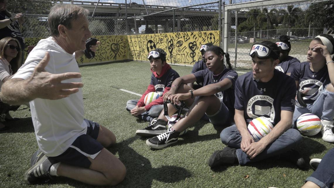Marcelo Landau, who recently opened a soccer academy in Little Havana for visually impaired children, talks to his players. He directed the city of Doral’s soccer programs for 17 years and plans to expand into Doral.