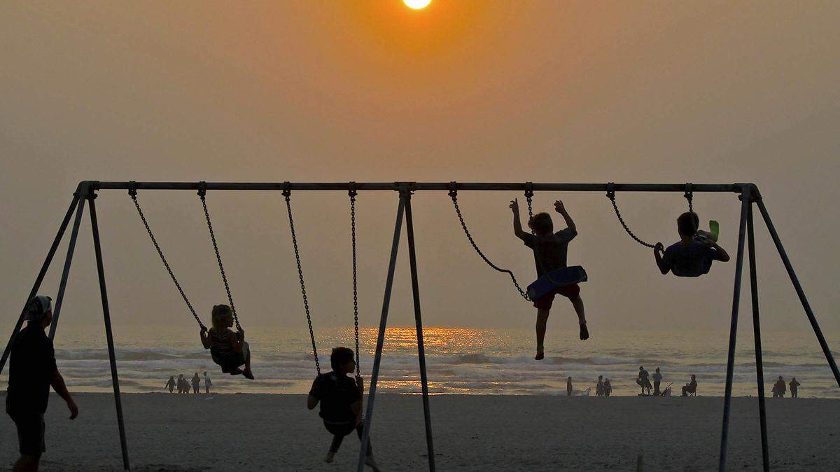 Niños juegan en Oregon el 21 de agosto de 2018.