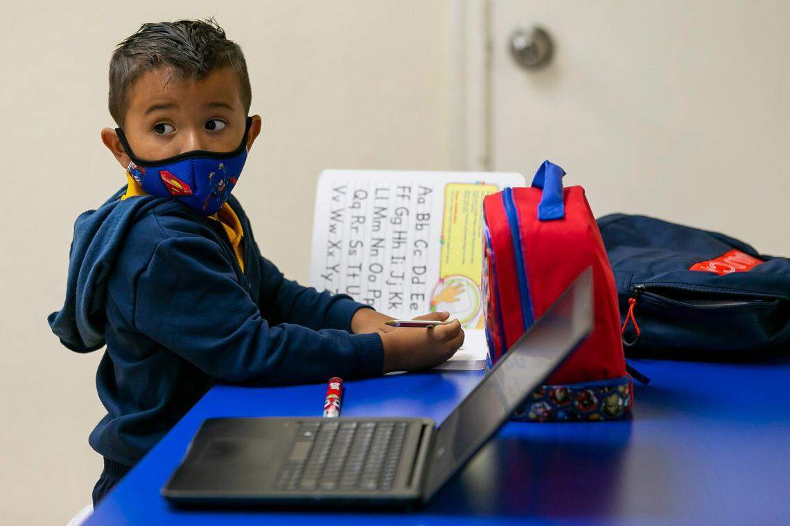 Jairo Beletzuy, 5, attends Miami Community Charter School in Flagler City, Fla. for the first day of class on Monday, August 31, 2020. Miami Community Charter is one of the few schools accommodating students who do not have Internet access at home or whose parents cannot stay home with them for remote learning.
