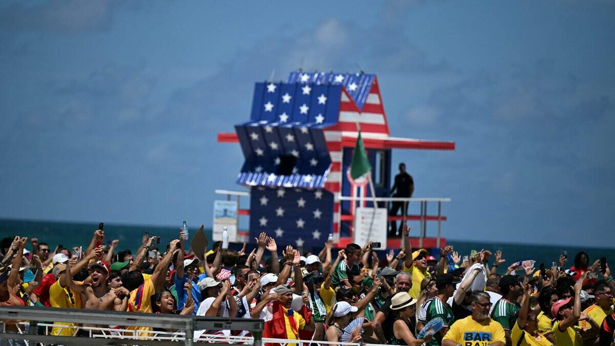 Fans a watch party for the opening match of the 2026 World Cup football tournament in Miami Beach, Florida, on June 11, 2026. (Photo by CHANDAN KHANNA / AFP via Getty Images)
