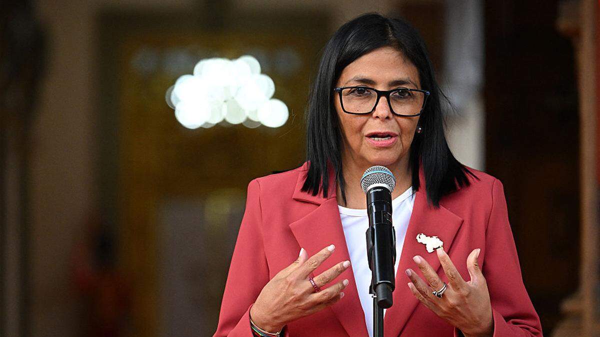 Venezuela's interim president, Delcy Rodriguez speaks alongside US Interior Secretary Doug Burgum (out of frame), after their meeting at the Miraflores Presidential Palace in Caracas on March 4, 2026. US Interior Secretary Doug Burgum on March 4, 2026, became the latest senior Trump administration official to visit Venezuela, as Washington pushes to ramp up oil and mineral production in the country. (Photo by Federico PARRA / AFP via Getty Images)