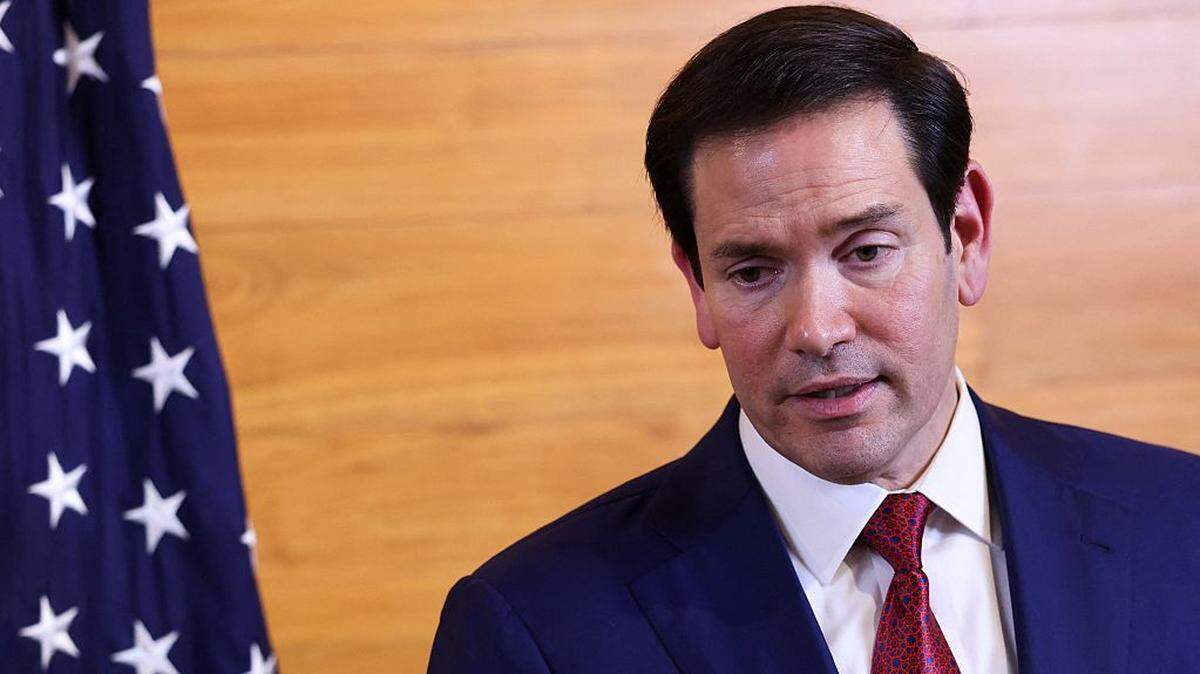 US Secretary of State Marco Rubio speaks to reporters in a departure lounge before returning to Washington following meetings with Caribbean Community (CARICOM) leaders, at Robert L. Bradshaw International Airport in Basseterre, Saint Kitts and Nevis on February 25, 2026. Rubio met with Caribbean leaders seeking a common line on Venezuela and pressure on Cuba. He also addressed President Donald Trump's priorities, including combating illegal immigration, drug trafficking and regional security. (Photo by Jonathan Ernst / POOL / AFP via Getty Images)
