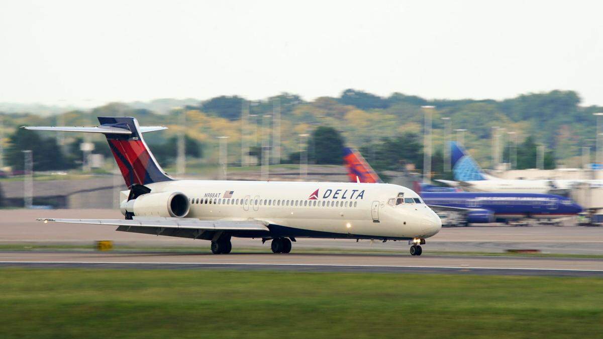 A Delta Airlines flight lands at Nashville International Airport in Nashville, Tenn., Wednesday, Sept. 6, 2023.