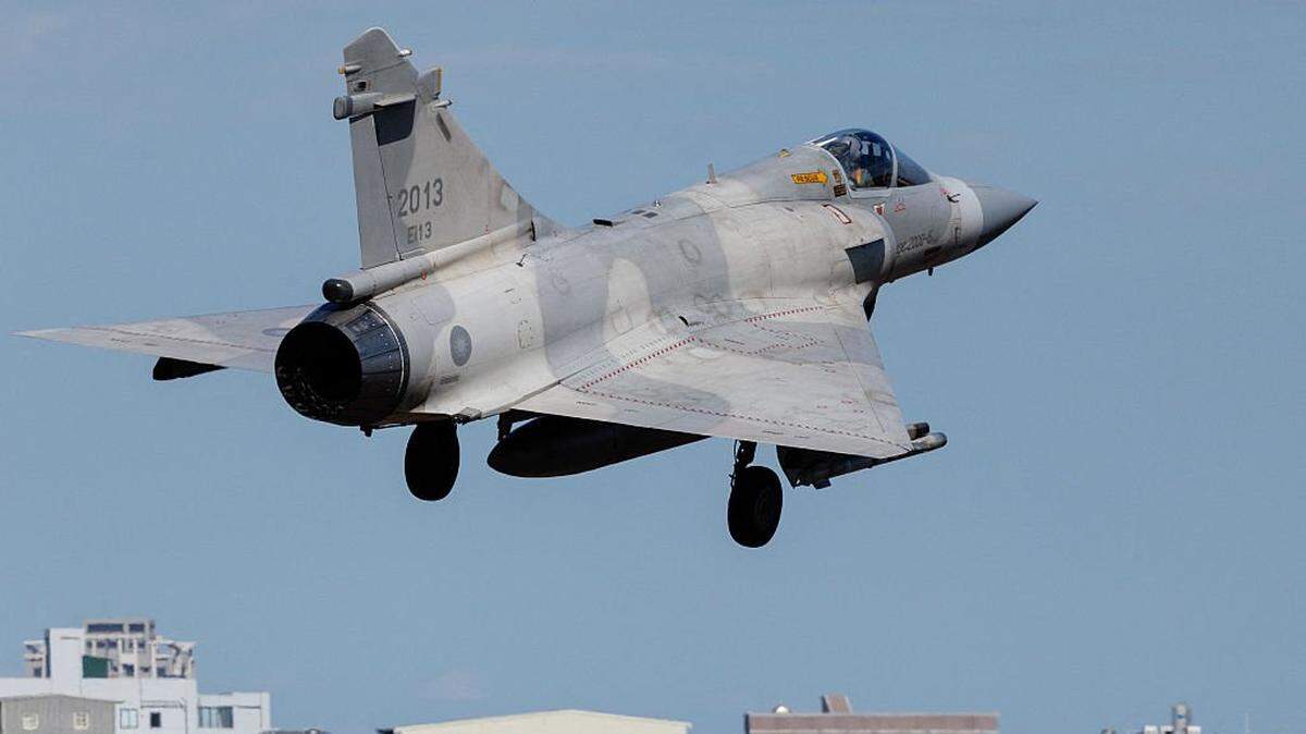 A Taiwanese air force Mirage 2000 fighter jet takes off at Hsinchu Air Base in Hsinchu on December 29, 2025. China launched "major" military exercises around Taiwan on December 29, in what it called a "stern warning" involving live-fire drills in waters and airspace near the island. Taiwan said Monday it had detected four Chinese coastguard ships near the island's waters. (Photo by CHENG Yu-chen / AFP via Getty Images)