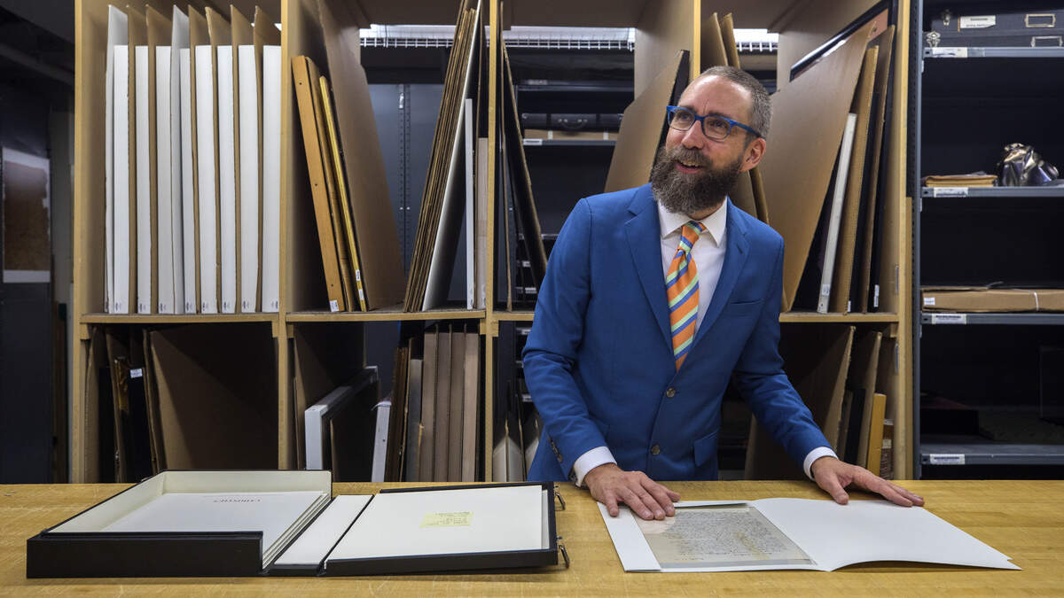Peter Klarnet, a senior specialist in manuscripts at Christie’s, shows a letter written in 1954 by Albert Einstein, which is being auctioned on Tuesday, December 4, 2018, in Manhattan, Nov. 28, 2018. The letter, in which Einstein called the word God “the expression of and product of human weaknesses,” is expected to fetch $1 million at auction. (Hiroko Masuike/The New York Times)